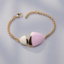 Złocona bransoletka na łańcuszku z różówo-białym dekorem. ADA 