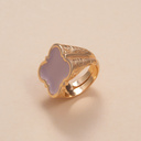 Pozłacany pierścień z różowym motywem romańskim z emalii. BLADYM ŚWITEM