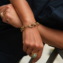 Pozłacana bransoletka z ogniw z ozdobnym zapięciem. FOLIGNO