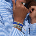 Pozłacany pierścionek z brązu z białą perłą i kulką. LUCE DI PERLA