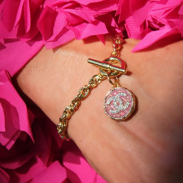 Złocona bransoletk z różowym guzikiem z cyrkoniami. MOULIN RÓŻ