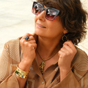 Sztywna szeroka pozłacana bransoleta o gładkiej powierzchni. PEŁNIA PRAGNIEŃ