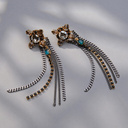 Zwiewne kolczyki z kryształami w czerni, błękicie i szampanie. KOBIETY KOMETY