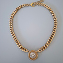 Złocony naszyjnik z zawieszką z rozetą z cyrkonii. GIANO