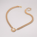 Pozłacany wisior z zawieszką z koniczynką z cyrkonii. AMELIA