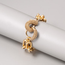 Pozłacana bransoletka z ogniw z ozdobnym zapięciem. FOLIGNO