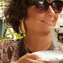 Pozłacane kolczyki wiszące w formie obłych trójkątów. DAJ MI TĘ NOC