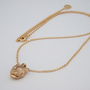 Pozłacany wisiorek z zawieszką z głową pantery z cyrkoniami. DZIKIE MALEŃSTWO